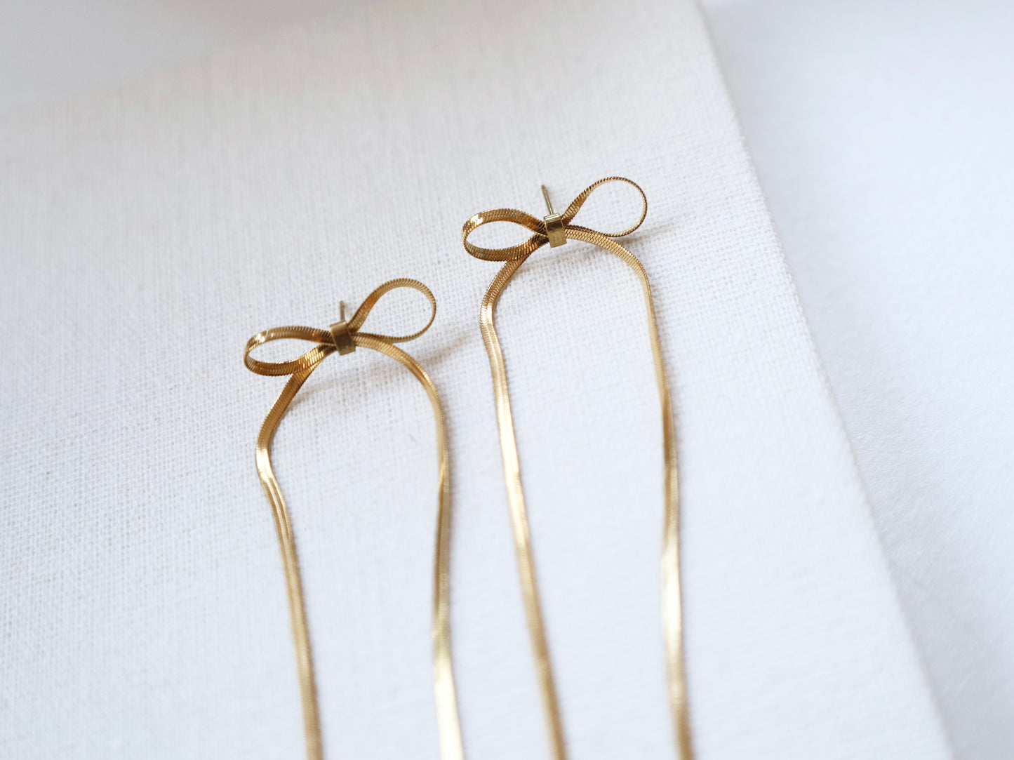 Gold Bow Snake Chain Drop Earrings