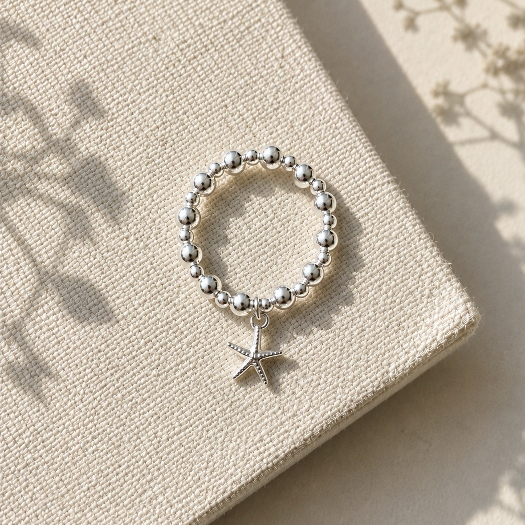 Tiny Starfish Charm Ring