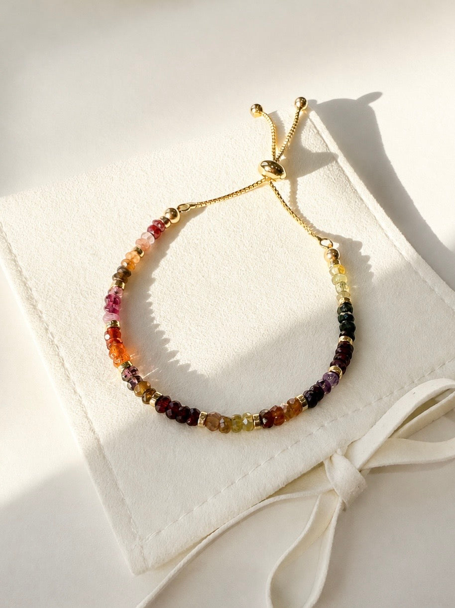 Gold Tundra Sapphire September birthstone bracelet displayed in natural sunlight