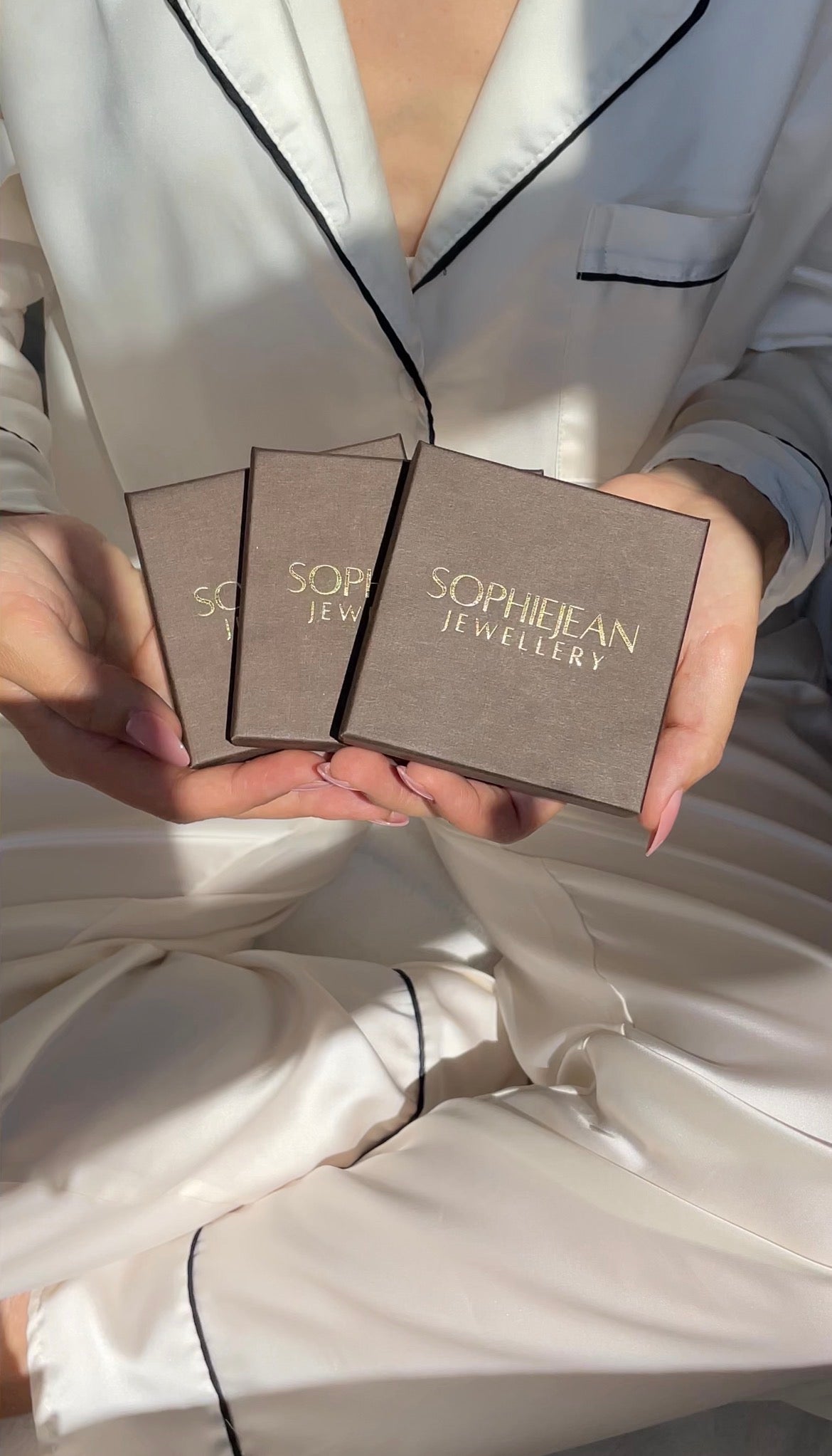 925 sterling silver shell locket necklace presented in SophieJean Jewellery luxury gift packaging.